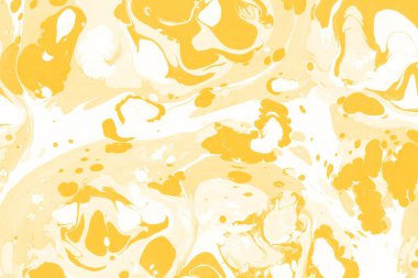 Sarı mermer arkaplan boya sıçrama deseni ile