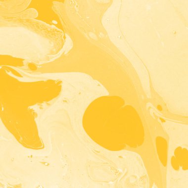 Sarı mermer arkaplan boya sıçrama deseni ile
