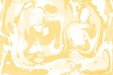 Sarı mermer arkaplan boya sıçrama deseni ile