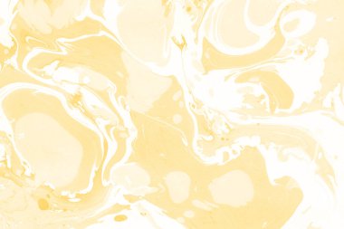 Sarı mermer arkaplan boya sıçrama deseni ile