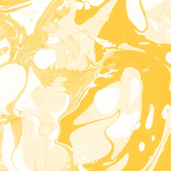 Sarı mermer arkaplan boya sıçrama deseni ile