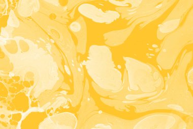 Sarı mermer arkaplan boya sıçrama deseni ile