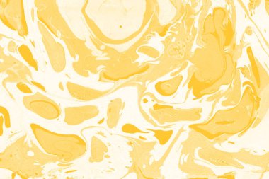 Sarı mermer arkaplan boya sıçrama deseni ile