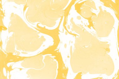 Sarı mermer arkaplan boya sıçrama deseni ile