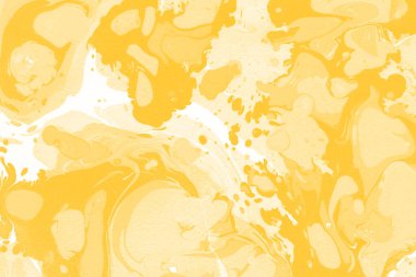 Sarı mermer arkaplan boya sıçrama deseni ile