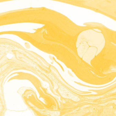 Sarı mermer arkaplan boya sıçrama deseni ile