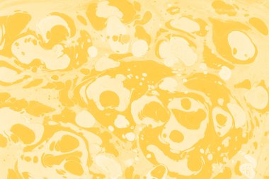 Sarı mermer arkaplan boya sıçrama deseni ile