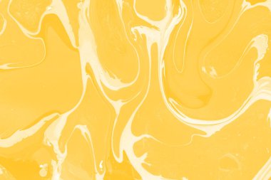 Sarı mermer arkaplan boya sıçrama deseni ile