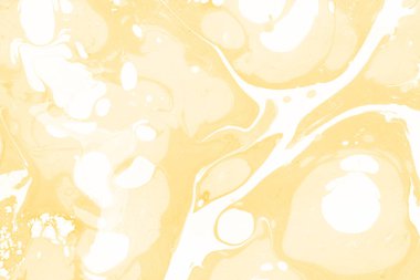 Sarı mermer arkaplan boya sıçrama deseni ile