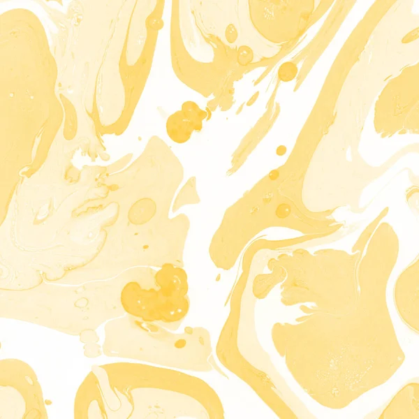 Sarı mermer arkaplan boya sıçrama deseni ile