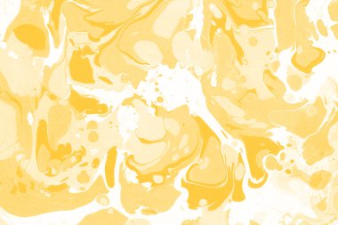 Sarı mermer arkaplan boya sıçrama deseni ile
