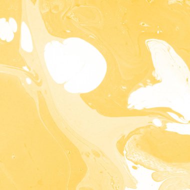 Sarı mermer arkaplan boya sıçrama deseni ile