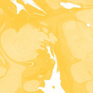 Sarı mermer arkaplan boya sıçrama deseni ile