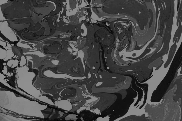 Kağıt arkaplanda siyah mermer mürekkep dokusu. Mermer taş resim.