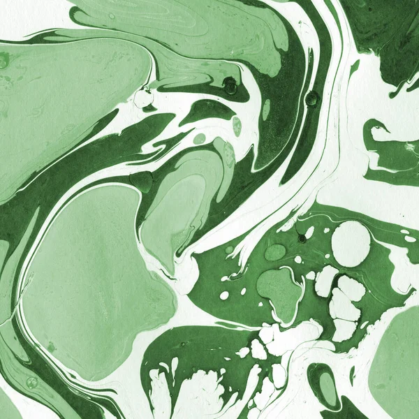 Green marble ink texture on watercolor paper background. Marble stone image.