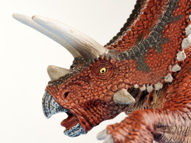 Beyaz arka planda izole dinozor