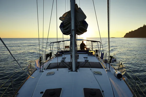 Yacht Sailing against sunset — Stock Photo, Image