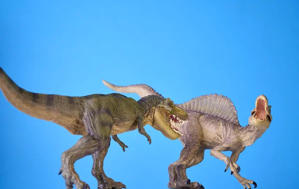 Dinosaurie i blå bakgrund — Stockfoto