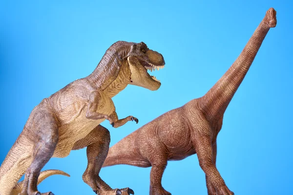 Dinosaurie i blå bakgrund — Stockfoto