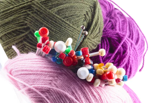 Variety of different knitting needles with wool — Stock Photo, Image