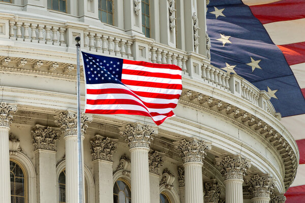 Washington DC Capitol detail with american flag