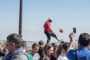 PARIS, FRANCE - MAY 1 2016 - Montmartre stairway crowded of people for sunday sunny day