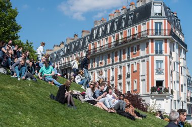 PARIS, FRANCE - MAY 1 2016 - Montmartre stairway crowded of people for sunday sunny day