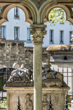 PARIS, FRANCE - MAY 2, 2016:  Abelard and Heloise tomb in Paris in the historic Pere Lachaise Cemetery.