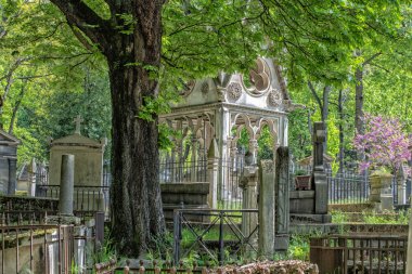 PARIS, FRANCE - MAY 2, 2016:  Abelard and Heloise tomb in Paris in the historic Pere Lachaise Cemetery.