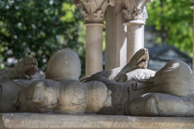 PARIS, FRANCE - MAY 2, 2016:  Abelard and Heloise tomb in Paris in the historic Pere Lachaise Cemetery.