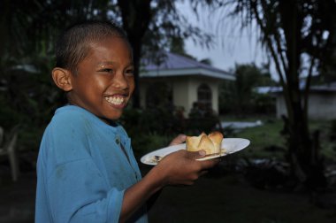 Cebu - Filipinler - Ocak, 1 2013 - yıllık yetim çocuk partisi