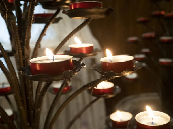 votive candles inside church of riomaggiore cinque terre pictoresque village liguria italy