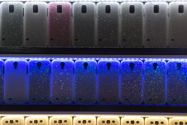 Gloeiende mobiele telefoon covers — Stockfoto