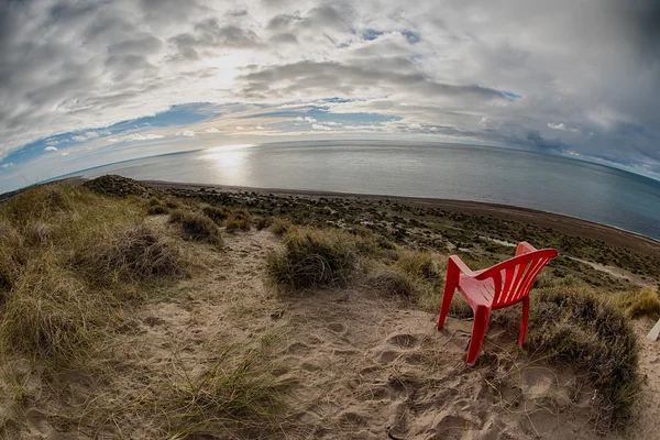 Chair outside patagonia lighthouse in valdes peninsula — Stock Photo, Image