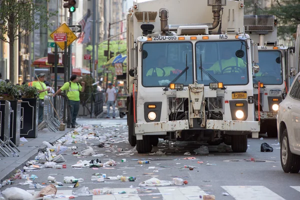 NEW YORK CITY  JUNE 14 2015 Trucks are cleaning the street after Annual Puerto Rico Day Parade