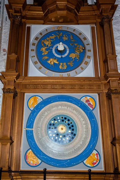 Ancient perpetual clock calendar on wood — Stock Photo, Image