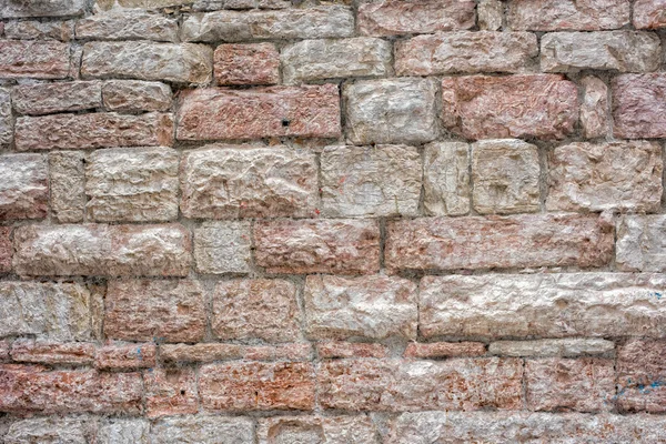 Детали стены из старых камней — стоковое фото