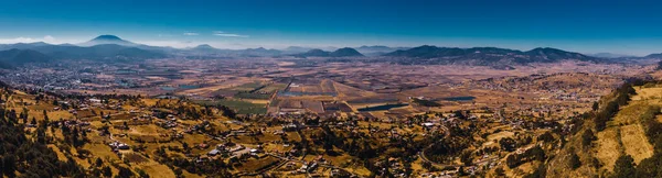 Aerial photograph of the valley of mirrors, in Acambay, State of Mexico. Mountains, small lakes, trees, houses and roads are distinguished.