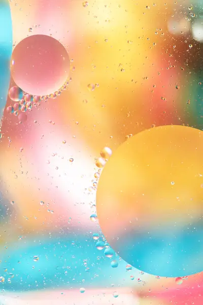 abstract colorful background of water drops, reflections, circles. Soft focus. Vertical.