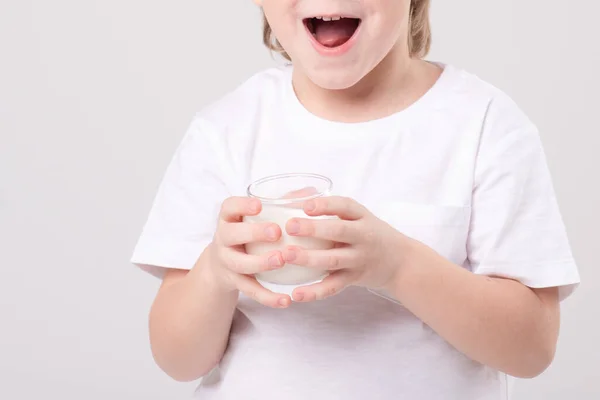 Portrait Blond Child Glass Milk White Background Expressive Smile Vitamins — стоковое фото