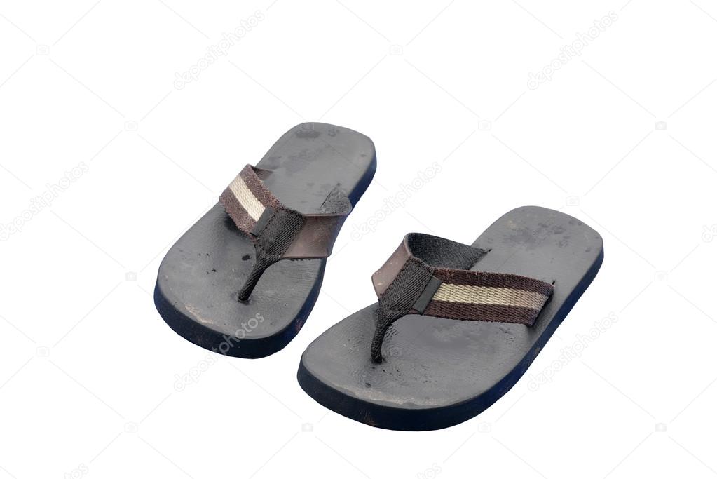 Pair of dirty black retro rubber sandals