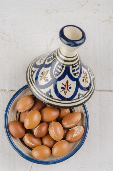 Argan Fruit on a wooden table top — Stock Photo, Image