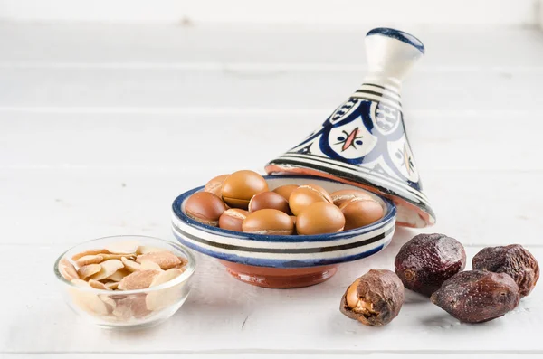 Argan Fruit on wooden tabletop