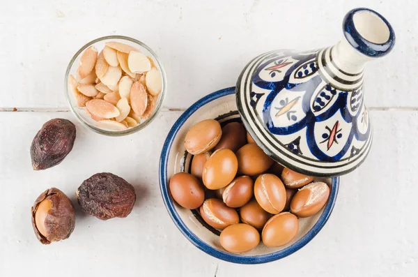 Argan Fruit on wooden tabletop — Stock Photo, Image