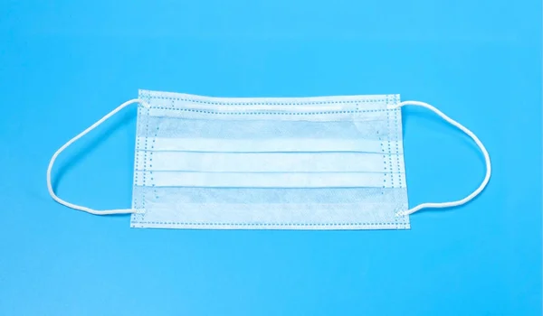 Disposable Medical Mask Blue Background — Stock Photo, Image