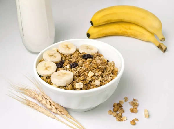 健康早餐燕麦片加香蕉和牛奶 图库图片