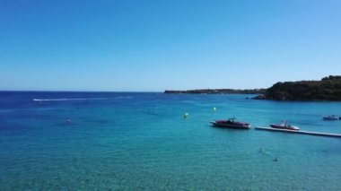 Aerial view of a jet ski boat in a deep blue colored sea, Zakynthos, Greece