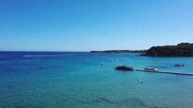 Aerial view of a jet ski boat in a deep blue colored sea, Zakynthos, Greece