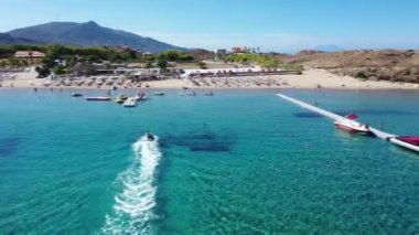 Aerial view of a jet ski boat in a deep blue colored sea, Zakynthos, Greece