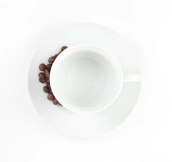 Empty coffee cup with coffee beans — Stock Photo, Image